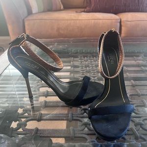 Gucci Black Heels with Gold Accents